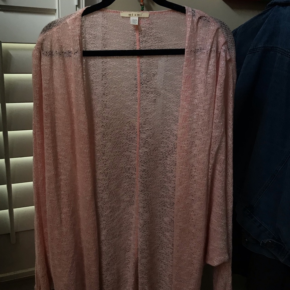 Francesca’s pink cardigan sweater